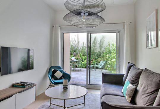 Appartement 1 chambre avec jardin privé